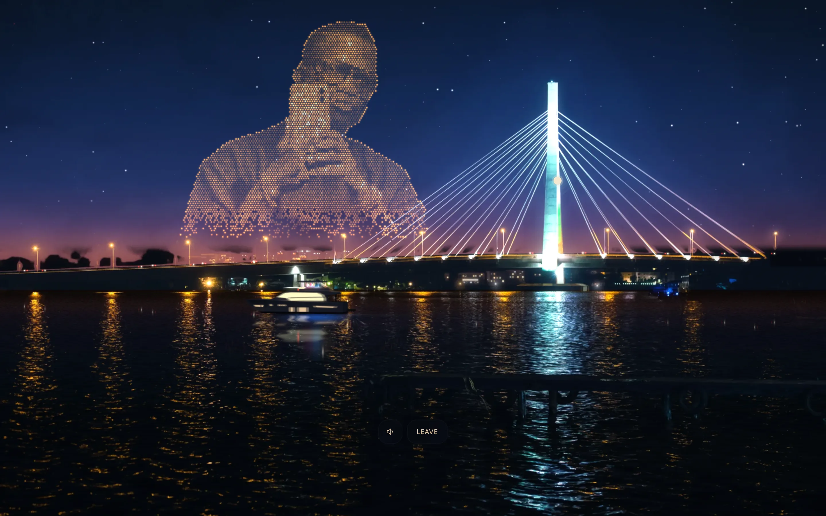 The home at night under IMMERSE: drones drawing my portrait in the sky beside the bridge's pylon, with a yacht on the lagoon